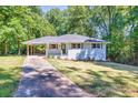 Charming brick home with well-maintained lawn and covered entry at 1875 Creekside Ct, Decatur, GA 30032