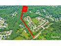 Aerial view showcases the property's location within a lush, green neighborhood at 836 Bailey Woods Rd, Dacula, GA 30019