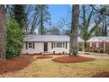Beautiful bungalow with freshly landscaped front yard and large tree at 3173 Canary Ct, Decatur, GA 30032