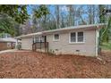 Attractive one-story brick house showcasing a welcoming entrance and well-kept landscaping at 1883 Windsor Sw Dr, Atlanta, GA 30311