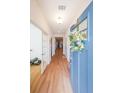 Bright entryway featuring wood floors and a charming door with a floral wreath at 171 Echols Bnd, Hiram, GA 30141