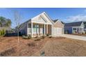 Inviting home boasting manicured front lawn, brick accents, and a covered entryway at 171 Echols Bnd, Hiram, GA 30141