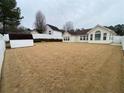 Large, fenced backyard with a shed, perfect for outdoor activities and storage at 5148 Centennial Creek Nw Vw, Acworth, GA 30102