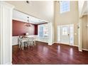 Elegant living room with hardwood floors, high ceilings, and ample natural light at 6158 Brookmere Pl, Mableton, GA 30126