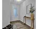 Welcoming entryway featuring a table with decorative items and a decorative rug at 2136 Garden Pl, Atlanta, GA 30316