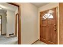 Inviting foyer with wood-paneled front door at 2516 Warwick Ne Cir, Atlanta, GA 30345