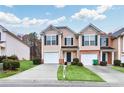 Charming two-story townhome with attached garage and lovely landscaping, perfect for a small Gathering at 3682 Harvest Dr, Decatur, GA 30034