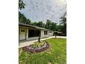 Charming brick home with manicured landscaping, walkway, and an attached garage at 1759 Wilmont Ne Dr, Atlanta, GA 30329