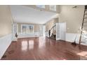 Bright living room with hardwood floors, ample windows, and natural light at 25 Pine Ferry Nw Dr, Kennesaw, GA 30144