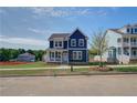Inviting two-story home with a neatly landscaped front yard and a mailbox at 4040 Andover Cir, Mcdonough, GA 30252