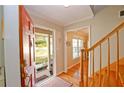 Bright entryway with hardwood floors and a view of the front yard at 4081 Deerwood Se Pkwy, Smyrna, GA 30082