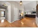 Inviting foyer with hardwood floors that leads into the living room, great for entertaining guests at 2955 Victoria Park Dr, Buford, GA 30519