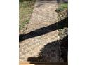 Close up image of walkway with textured pavers, creating visual interest for curb appeal at 1537 David Lee St, Acworth, GA 30102