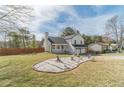Beautiful front yard with an ornamental rock garden and a well-maintained lawn at 785 Josh Ln, Lawrenceville, GA 30045