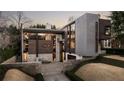 Stunning modern home featuring stone, wood, and metal accents with beautiful landscaping at 79 Beverly Ne Rd, Atlanta, GA 30309