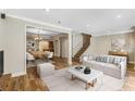 Bright living room and dining area with hardwood floors and neutral decor at 1106 Hampton Ne Way, Atlanta, GA 30324