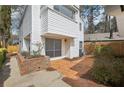 The home features a brick patio with access from sliding glass doors at 2979 Grey Squirrel Se Ct, Marietta, GA 30067