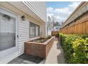 The side of the home features a small garden and is well-maintained at 2979 Grey Squirrel Se Ct, Marietta, GA 30067