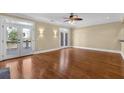 Spacious living room with hardwood floors, double french doors, and natural lighting at 775 Mountain View Nw Ter, Marietta, GA 30064