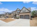 Beautiful home with two car garage and lovely landscaping at 1695 Stone Meadow Rd, Lithonia, GA 30058