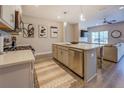 Modern kitchen featuring an island with stainless steel appliances and stylish decor at 1840 Eastmore Ave, Conyers, GA 30094
