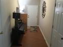 Welcoming hallway featuring wood floors, neutral walls, and decorative elements, creating a warm and inviting entrance at 789 Celeste Sw Ln, Atlanta, GA 30331