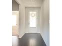 Bright entryway with wood flooring, leading to the other rooms at 1649 Auburn Ridge Way, Dacula, GA 30019