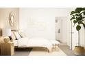 Relaxing bedroom with a modern design, light colors, and a large houseplant at 2443 Livi Ln, Buford, GA 30519