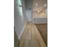 Inviting entryway with new laminate flooring and modern light fixture welcomes you inside at 3260 Valley Bend Rd, Atlanta, GA 30349