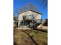 Back exterior featuring a wooden deck, offering a relaxing outdoor space at 109 Thirkield Se Ave, Atlanta, GA 30315
