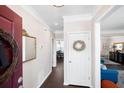 Bright entryway with hardwood floors, white trim, and an inviting view into the adjacent living spaces at 3952 Rhyne Way, Smyrna, GA 30082