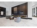 Modern lobby with a sleek fireplace and contemporary decor, offering a welcoming ambiance at 400 W Peachtree Nw St # 1408, Atlanta, GA 30308
