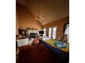 Bedroom features a fireplace, ceiling fan, and access to the backyard at 305 Savannah Pl, Douglasville, GA 30134