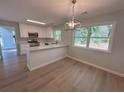 Bright kitchen features a kitchen island and stainless steel appliances at 3825 Emerson St, Marietta, GA 30062