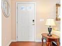 Bright entryway showcasing a stylish door, wood floors, and decorative accents for a welcoming atmosphere at 2160 Carefree Cir # 9, Marietta, GA 30062