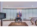 Comfortable lobby area with modern decor, seating, and an escalator at 20 Marietta Nw St # 15D, Atlanta, GA 30303