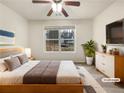Staged bedroom with neutral tones, a queen bed, and a large window at 781 Courthouse Park Dr, Temple, GA 30179