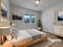 Serene bedroom with a large window, neutral decor, and wood-look flooring for a modern touch at 51 Lost Meadows Dr, Dallas, GA 30157