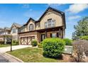 Charming two-story home featuring stone accents, a two-car garage, and a beautifully landscaped front yard at 5928 Cobblestone Creek Cir, Mableton, GA 30126