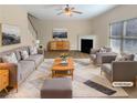 Bright living room featuring neutral paint colors, modern furniture and a fireplace at 1181 Paramount Dr, Mcdonough, GA 30253