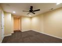 The carpeted basement features recessed lighting, a ceiling fan, and neutral walls at 239 Valley Xing, Canton, GA 30114