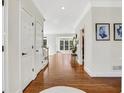 Inviting foyer featuring hardwood floors, fresh paint, and ample natural light at 820 Thermopylae Ct, Alpharetta, GA 30005