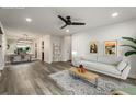 Spacious living room featuring contemporary decor, ample natural light, and modern flooring at 6851 Roswell Rd # N10, Sandy Springs, GA 30328