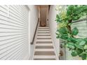 Inviting entryway featuring a staircase, a decorative wreath, and neutral paint tones at 2655 Sarah Carlin Ct, Norcross, GA 30071