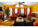 Spacious living room with vaulted ceilings, multiple windows, and stylish decor at 703 Cypress Pointe St, Alpharetta, GA 30022