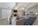 Comfortable living room features vaulted ceilings, fireplace, and cozy seating at 2390 Morgan Ne Rd, Marietta, GA 30066