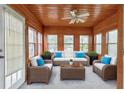 Bright sunroom with wood paneled ceiling and walls with lots of windows at 2390 Morgan Ne Rd, Marietta, GA 30066