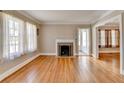 Bright living room with hardwood floors, neutral walls and decorative fireplace at 2953 Hardman Ne Ct, Atlanta, GA 30305