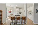 Open kitchen with a large center island, bar stool seating, and stainless steel appliances at 424 Lindbergh Ne Dr # 201, Atlanta, GA 30305