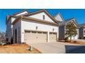 Spacious two-car garage with a wide driveway and clean, modern design at 219 Dawson Dr, Woodstock, GA 30188